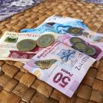 Mexican pesos should be on your riviera maya packing list and kept in your wallet or purse
