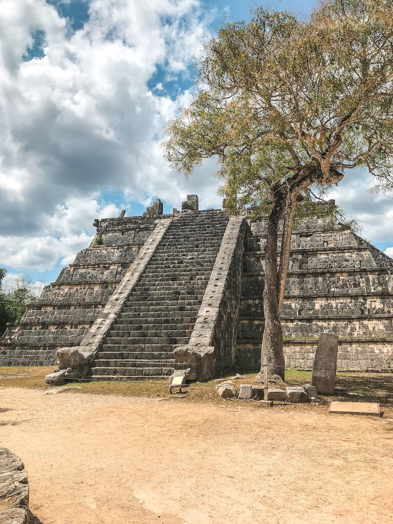 a pyramid structure at Mexico's Chichen Itza archaeological site is a popular day trip from all-inclusive resorts in Cancun