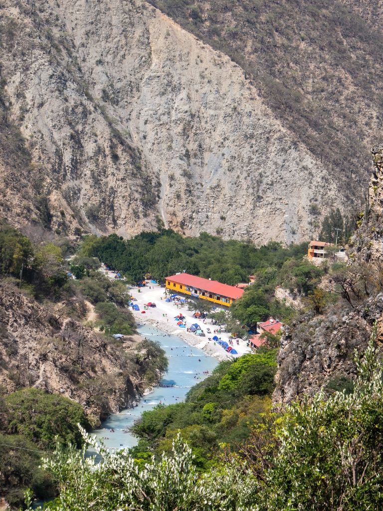 looking down on the Tolantongo River with the campground and hotels in the distance